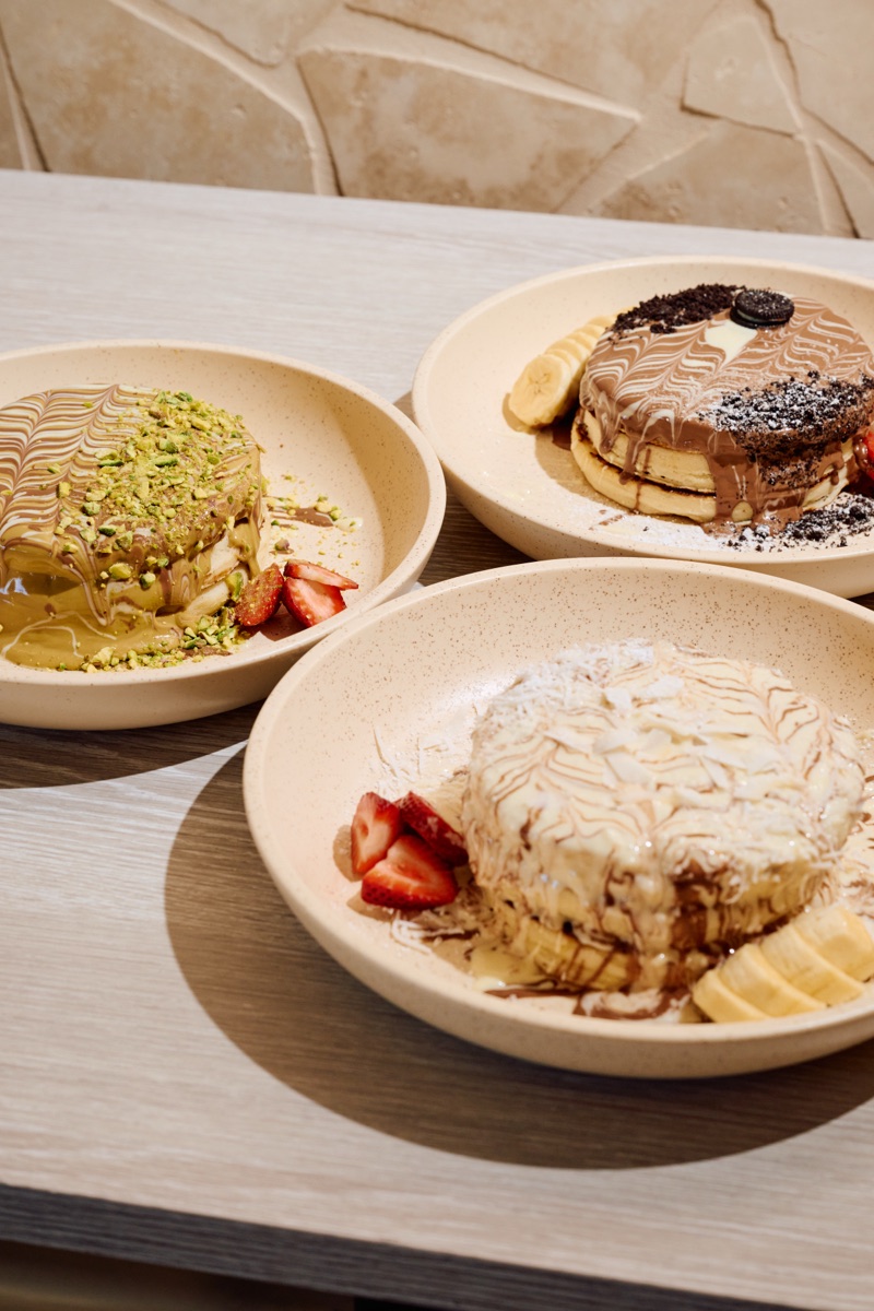 A selection of URTH pancakes and crêpes served with fruit