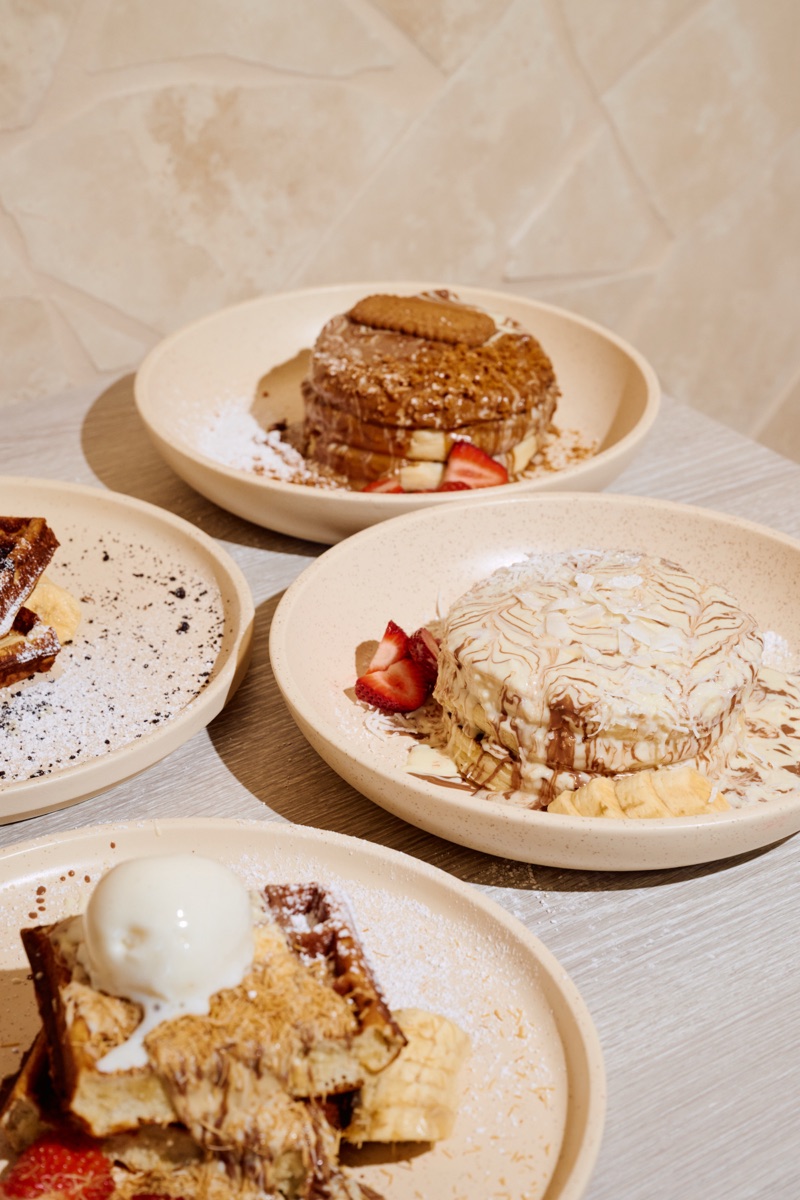 A selection of URTH pancakes and crêpes served with fruit